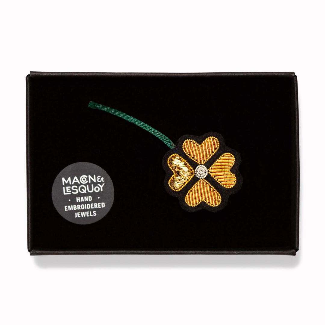 Hand-embroidered 4 Chances lapel pin by Parisian fashion accessory brand Macon et Lesquoy. Measuring approximately 25mm by 25mm, the Light Heart is part of their 'Rock like an Egyptian' Collection.