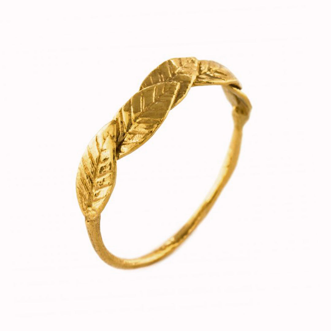 Bird of Paradise leaves wrap around to form a nature inspired ring, from award winning London jeweller Alex Monroe. Stackable with other rings or elegant worn alone.