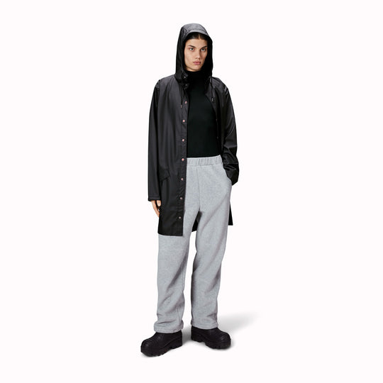 Contemporary unisex rain jacket from Danish Outerwear and Lifestyle company Rains. This long black rain jacket is c<span data-mce-fragment="1">haracterized by a minimal silhouette in a long design.</span>