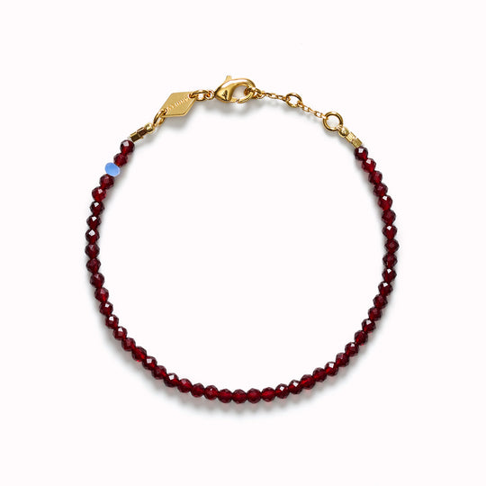 The Tan Line Deep Burgundy bracelet by Anni Lu is a vibrant and playful piece, reflecting the latest fashion colour trends.