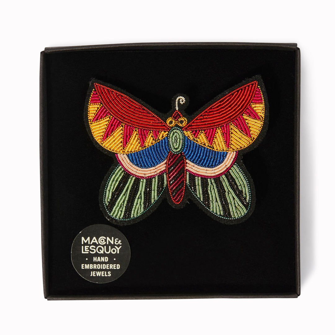 Hand-embroidered Butterfly lapel pin by Parisian fashion accessory brand Macon et Lesquoy. Measuring approximately 61mm by 49mm