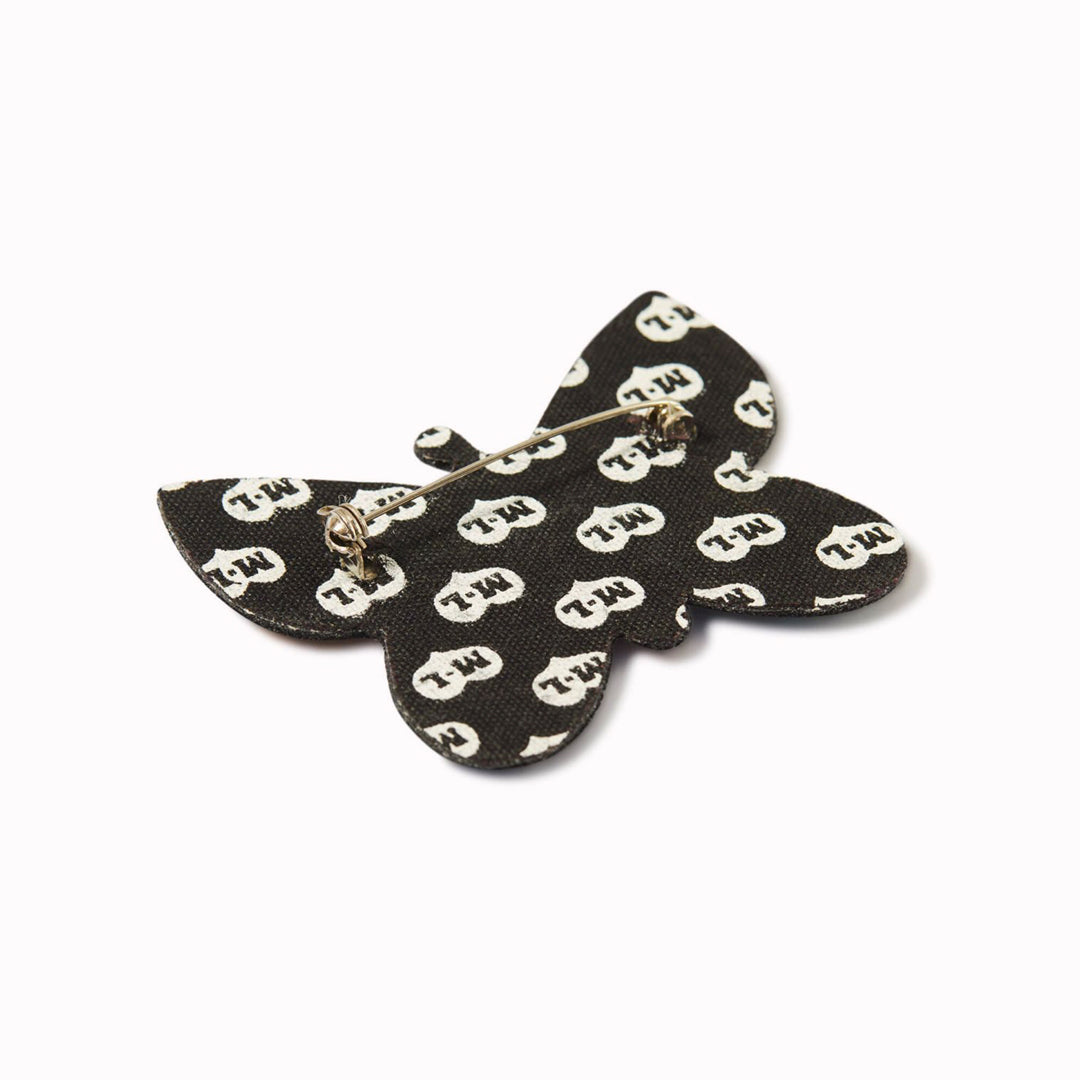 Hand-embroidered Butterfly lapel pin by Parisian fashion accessory brand Macon et Lesquoy. Measuring approximately 61mm by 49mm