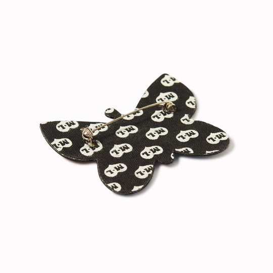 Hand-embroidered Butterfly lapel pin by Parisian fashion accessory brand Macon et Lesquoy. Measuring approximately 61mm by 49mm