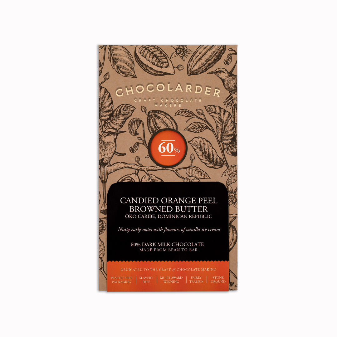 The smooth milk chocolate features scattered pieces of candied orange peel.