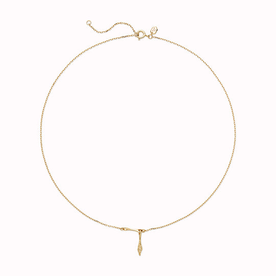 In Gold, Carrion necklace from Maria Black, a bold and captivating statement piece that elevates your style.