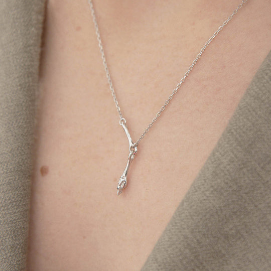 As Worn. Carrion necklace from Maria Black, a bold and captivating statement piece that elevates your style.