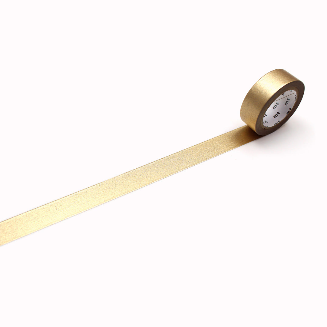 Champagne Gold Washi Tape from MT Tape is a versatile and decorative adhesive tape that can be used for various crafts and projects. It has a metallic gold colour that adds a touch of elegance and sophistication to any surface.