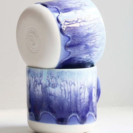 Blue over White heavy glazed, Japanese inspired ceramic mug from Studio Arhoj. The Chug Mug features their trademark thick, hand poured coloured glaze which means that each mug is unique.