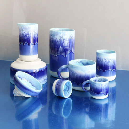 Blue over White heavy glazed, Japanese inspired ceramic mug from Studio Arhoj. The Chug Mug features their trademark thick, hand poured coloured glaze which means that each mug is unique.