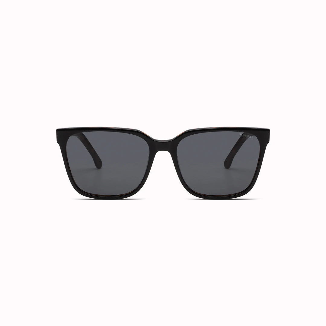 Strong lines, elegant and fine. The Cole makes sure to bring out your best features with its fine acetate frame. The Cole Black Tortoise sunglasses feature a black frame edged with tortoiseshell in Eco Acetate and solid smoke lenses. Subtly striking.