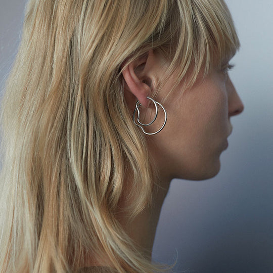 As Worn - This hoop features a bend placed north, south, east and west, representing Copenhagen the city they were designed in.