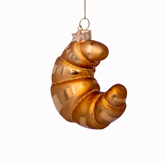 Inject some sparkly fun into your Christmas tree with this hand painted and mouth blown glass Croissant ornamental Christmas tree decoration by Vondels.