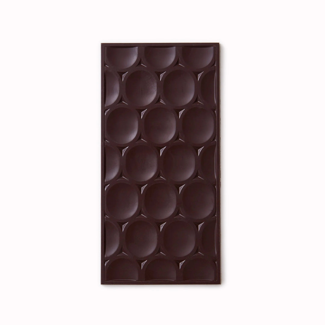 Madagascar Milk 58% bar is a creamy luxurious milk chocolate bar with notes of caramel and treacle and the zesty finish characteristic of Madagascan beans.