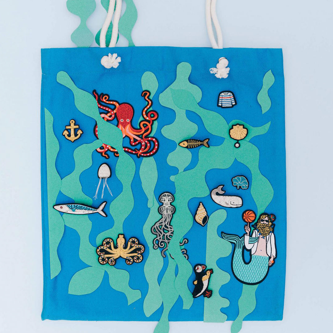 Hand-embroidered Golden Anchor lapel pin by Parisian fashion accessory brand Macon et Lesquoy. Measuring approximately 38mm by 30mm