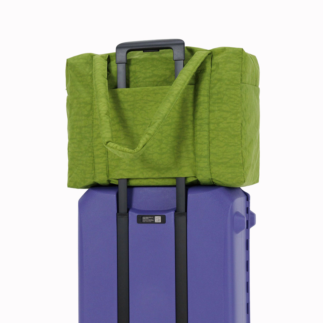 Large Cloud Carry-On in Green Juice from Baggu, an impeccably crafted travel essential designed for discerning travelers.