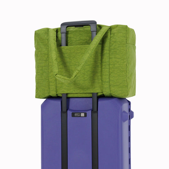 Large Cloud Carry-On in Green Juice from Baggu, an impeccably crafted travel essential designed for discerning travelers.