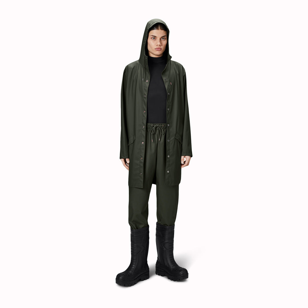 contemporary unisex rain jacket from Danish Outerwear and Lifestyle company Rains. This long green rain jacket is characterized by a minimal silhouette in a long design.
