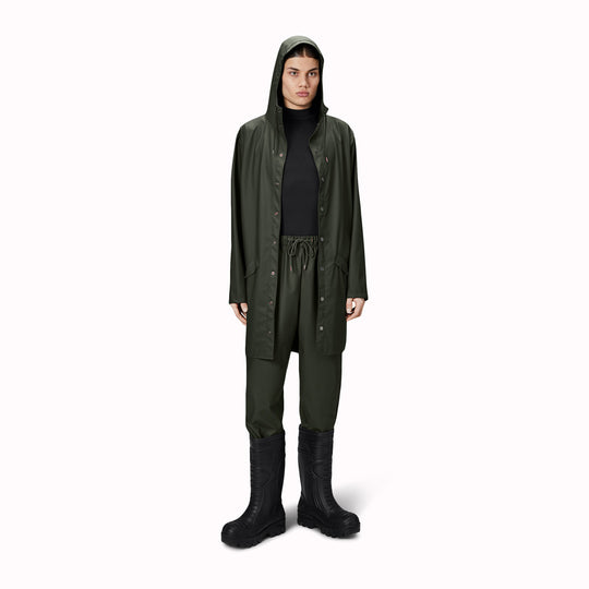 contemporary unisex rain jacket from Danish Outerwear and Lifestyle company Rains. This long green rain jacket is characterized by a minimal silhouette in a long design.