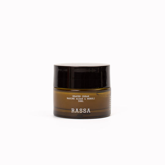 Brown jar of Rassa Heaven face cream on a white background