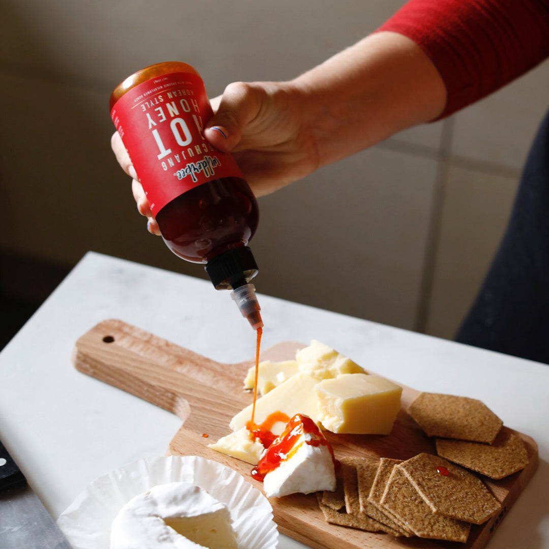 Produced with an ethically farmed, bee-friendly, organic wildflower honey, and infused with a fruity, fiery blend of sustainably grown fresh scotch bonnet chillies - combined with a traditional fermented Korean Gochujang for a sweet, spicy, umami kick