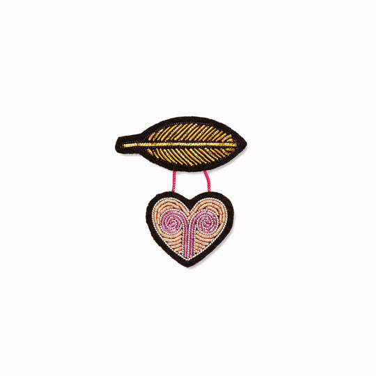 Hand-embroidered Light Heart lapel pin by Parisian fashion accessory brand Macon et Lesquoy. Measuring approximately 41mm by 46mm, the Light Heart is part of their 'Rock like an Egyptian' Collection.