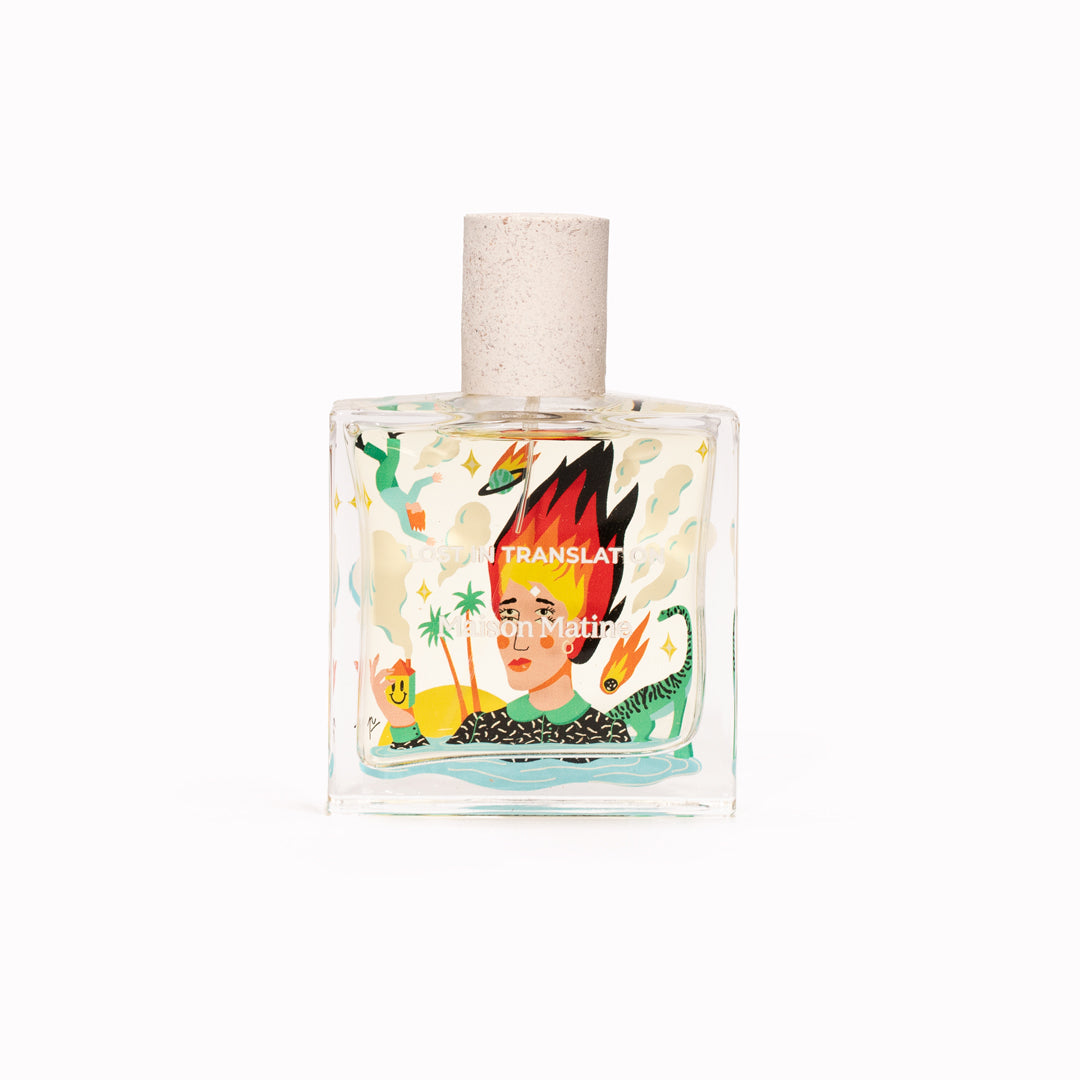 Maison Matine's 'Lost in Translation' is a scent inspired by the idea of living life to the full, this being the first day of the rest of your life, all housed in an illustrative glass bottle. 50ml glass bottle with flaming haired head shown.
