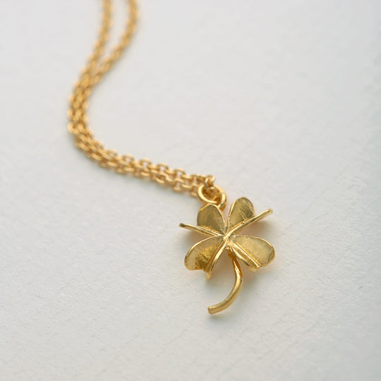 Lucky Clover is an elegant four leaf clover pendant necklace by London jeweller Alex Monroe, available in Sterling Silver or 22ct Fairmined Gold Plated silver.