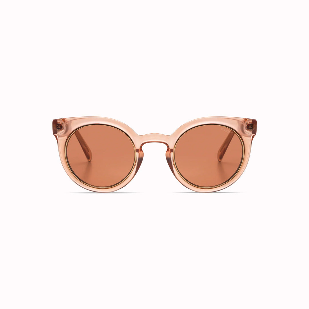The Lulu features a unique combination of round lenses set in a cat-eye frame and offers unparalleled style and protection with a 133mm x 49.4mm Bio Nylon frame, 100% UV400 lenses, and scratch-resistant PC lens. The gorgeous sunglasses feature a translucent rose coloured frame with solid light burgundy lenses. The perfect rose-tinted glasses!