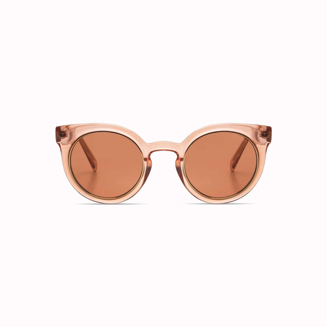 The Lulu features a unique combination of round lenses set in a cat-eye frame and offers unparalleled style and protection with a 133mm x 49.4mm Bio Nylon frame, 100% UV400 lenses, and scratch-resistant PC lens. The gorgeous sunglasses feature a translucent rose coloured frame with solid light burgundy lenses. The perfect rose-tinted glasses!