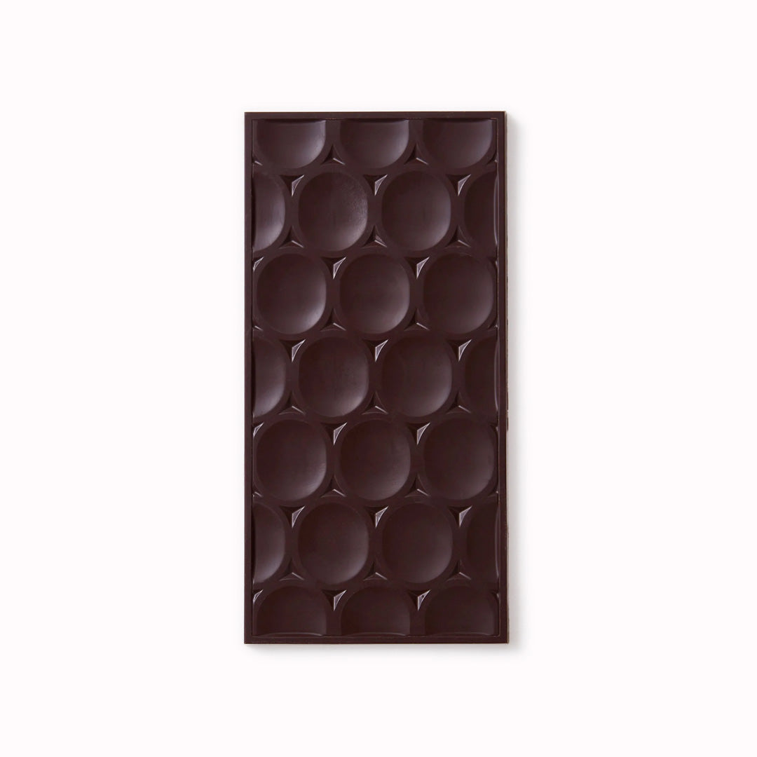 The Madagascar 72% dark chocolate bar is an exquisite and flavour packed chocolate, with high notes of citrus, and cherry Bakewell Tart.