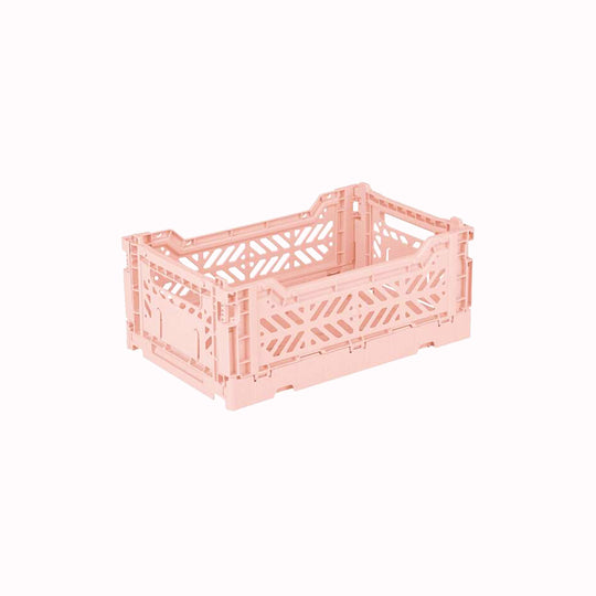 Mini Milk Tea Folding Crate from Aykasa. This crate is made from 100% recyclable material and can be folded flat when not in use. It's perfect for holding books, toys, clothes, or anything else you want to organise. 