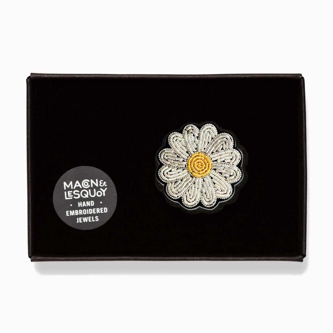 Hand-embroidered Mini Daisy lapel pin by Parisian fashion accessory brand Macon et Lesquoy. Measuring approximately 30mm by 30mm, the mini daisy brooch is part of their 'Timeless Creations' Collection