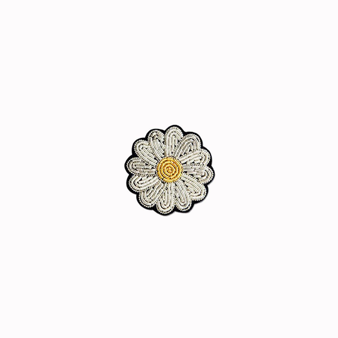 Hand-embroidered Mini Daisy lapel pin by Parisian fashion accessory brand Macon et Lesquoy. Measuring approximately 30mm by 30mm, the mini daisy brooch is part of their 'Timeless Creations' Collection