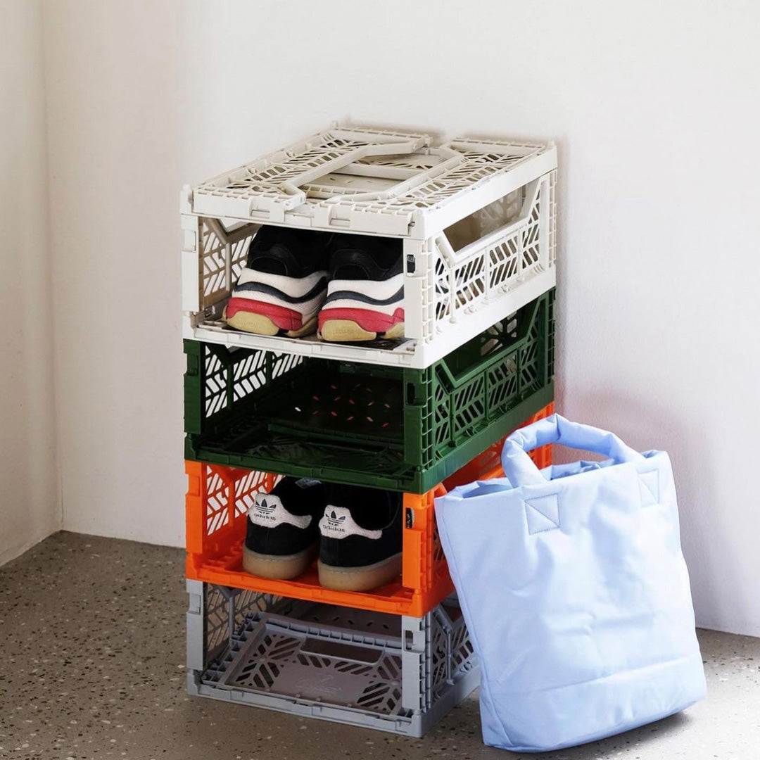 As a Shoerack, Folding Crate from Aykasa. This crate is made from 100% recyclable material and can be folded flat when not in use. It's perfect for holding books, toys, clothes, or anything else you want to organise.