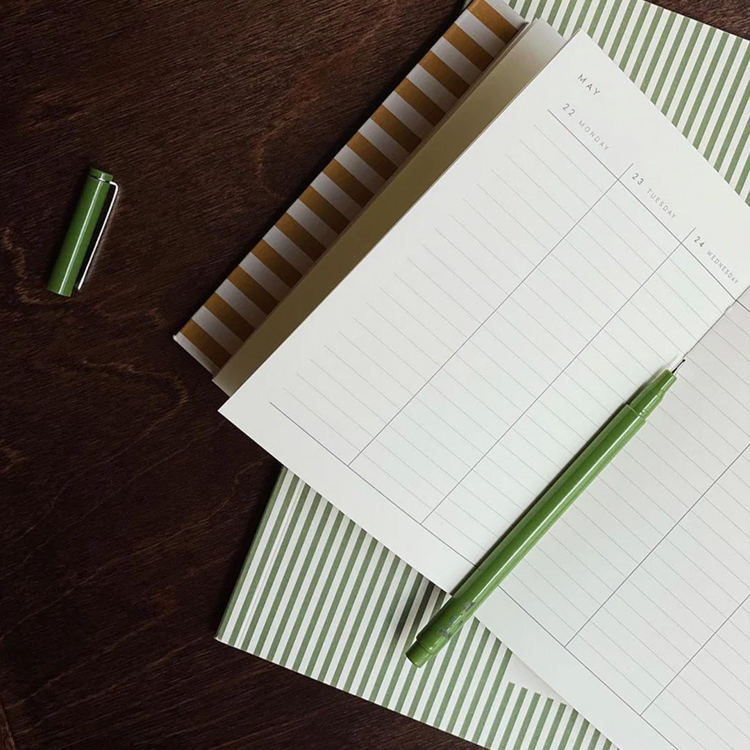 Notem Stationery, Danish Stationery brand. Diary and lined notebooks with pen on table