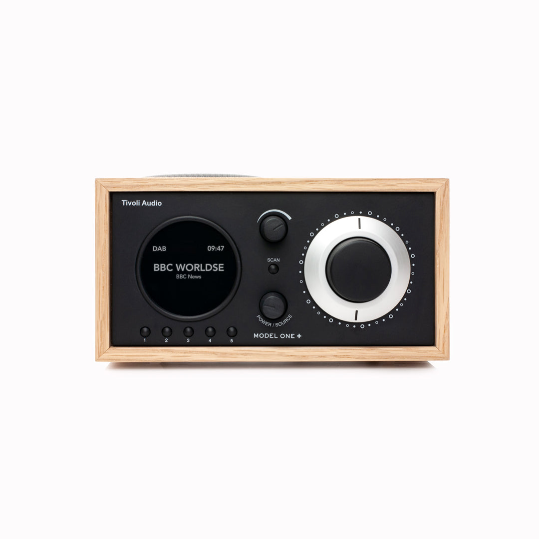 The Model One+ offers a sophisticated blend of classic design and modern audio technology, perfectly suited for any setting. This versatile table radio provides comprehensive listening options, including crystal-clear DAB/DAB+ digital radio, traditional FM, and convenient Bluetooth connectivity for wireless streaming.