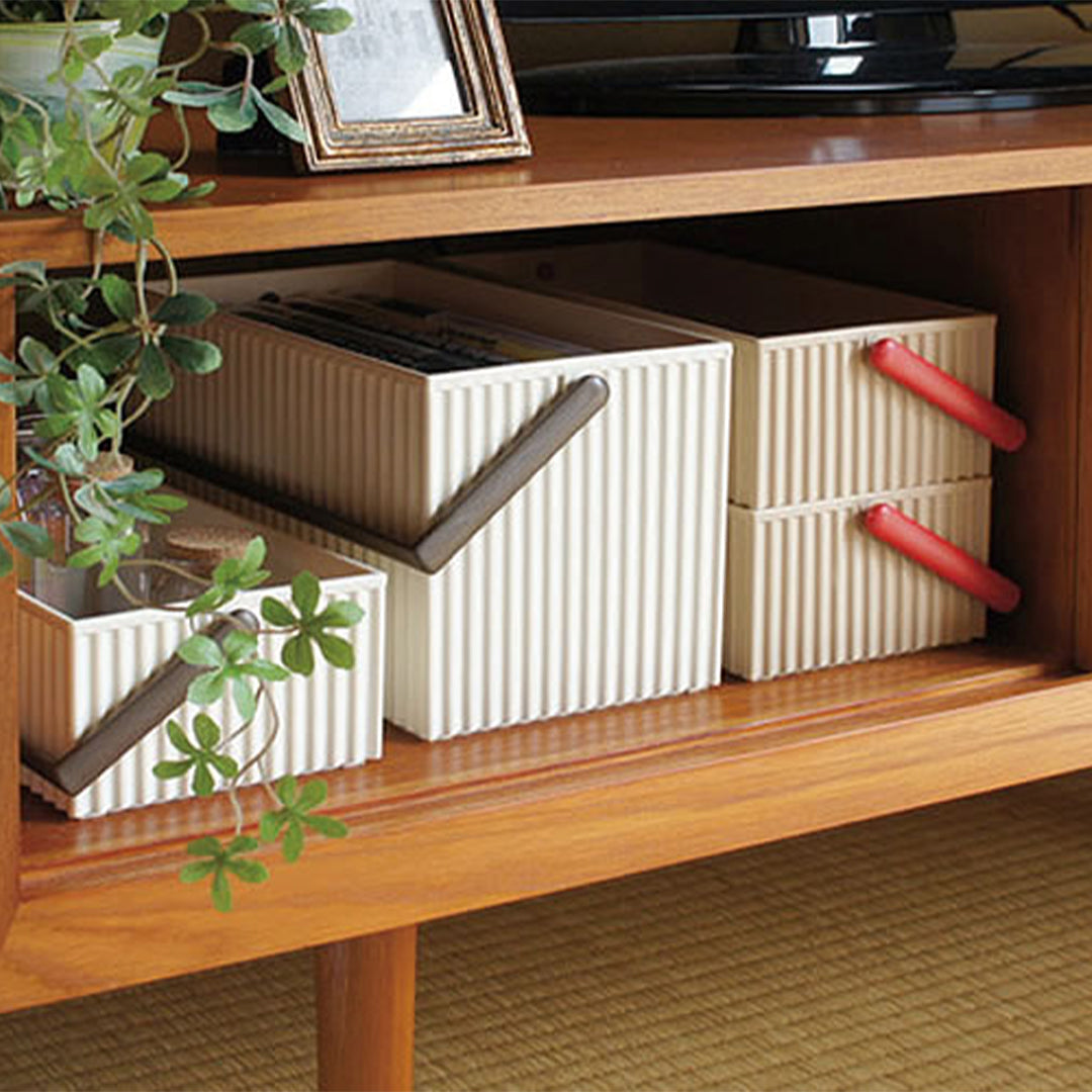 Omnioffre is a range of stylish Japanese stackable storage boxes with colour coordinated carry handles.