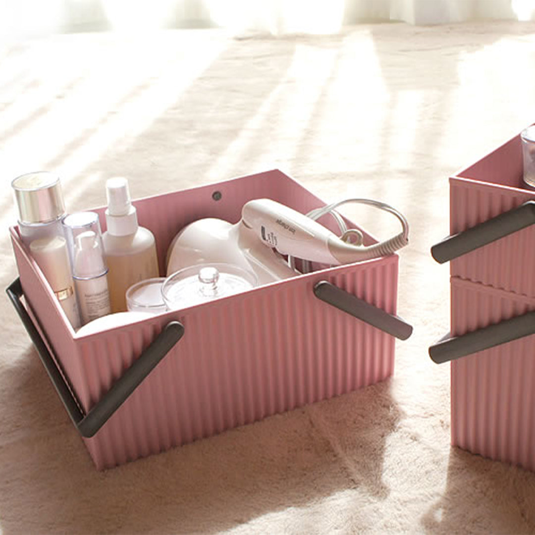 Omnioffre is a range of stylish Japanese stackable storage boxes with colour coordinated carry handles.