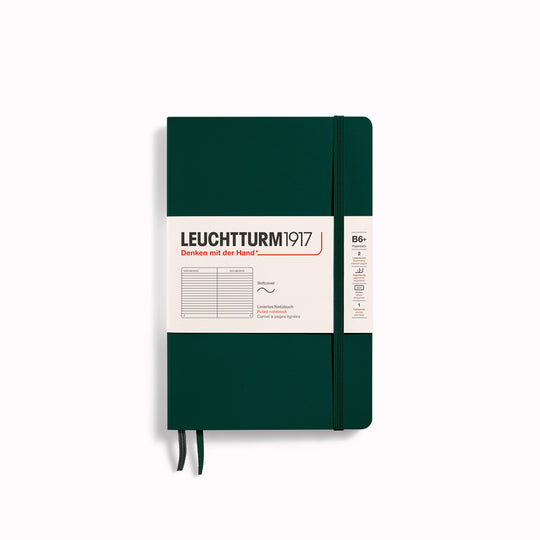 The B6+ Hardcover Lined Notebook features 2 page markers, a blank table of contents, numbered pages, a gusseted pocket for loose notes and business cards