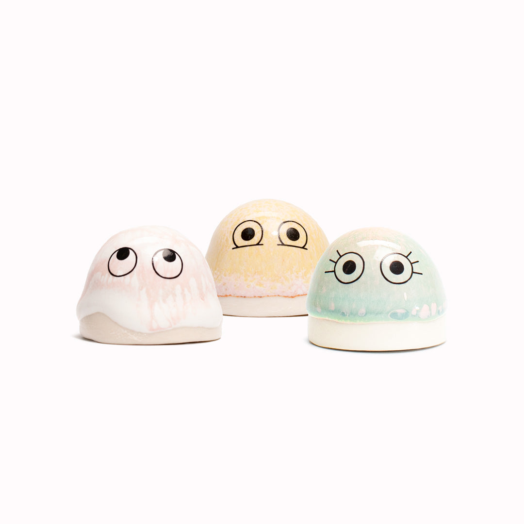 The smallest of the Arhoj decorative ornament figurine family, these tiny little cute dots still have all the personality of their larger siblings. Mostly white or pale with coloured highlights and handmade in Copenhagen, they have all the Arhoj trademarks with their thick multi coloured glazes and Japanese ceramic influence.