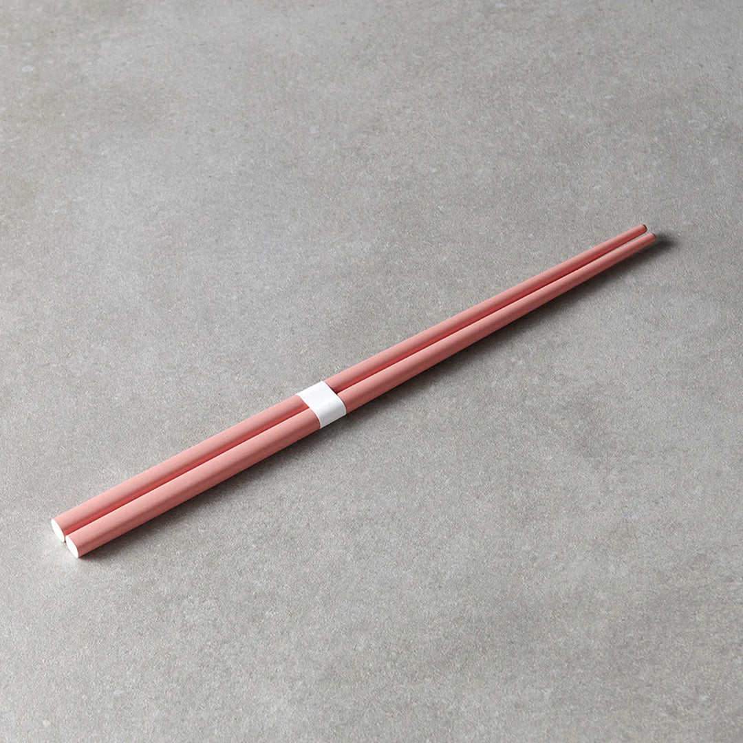 Pink lacquerware finish with white accent chopsticks from Made in Japan. This Chopstick collection is designed and made at the Zumi workshop in Fukui prefecture, Japan.
