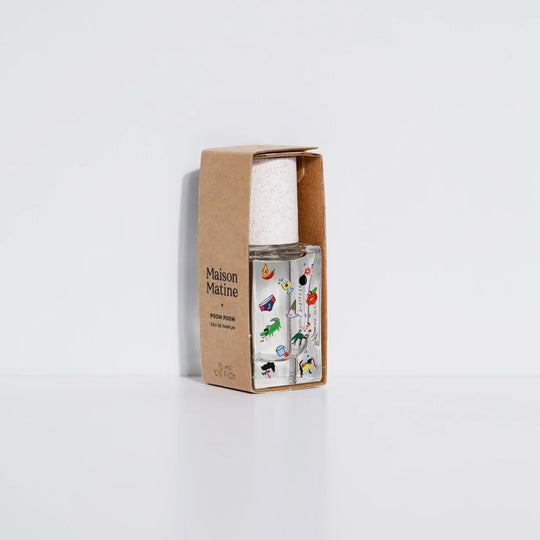 Maison Matine's 'Poom Poom' is a scent that is a carefree ode to life itself... floral, woody, musky and happy! The perfume comes in a beautiful illustrative bottle. 15ml bottle with cardboard sleeve. Illustrated with cartoon-style imagery.