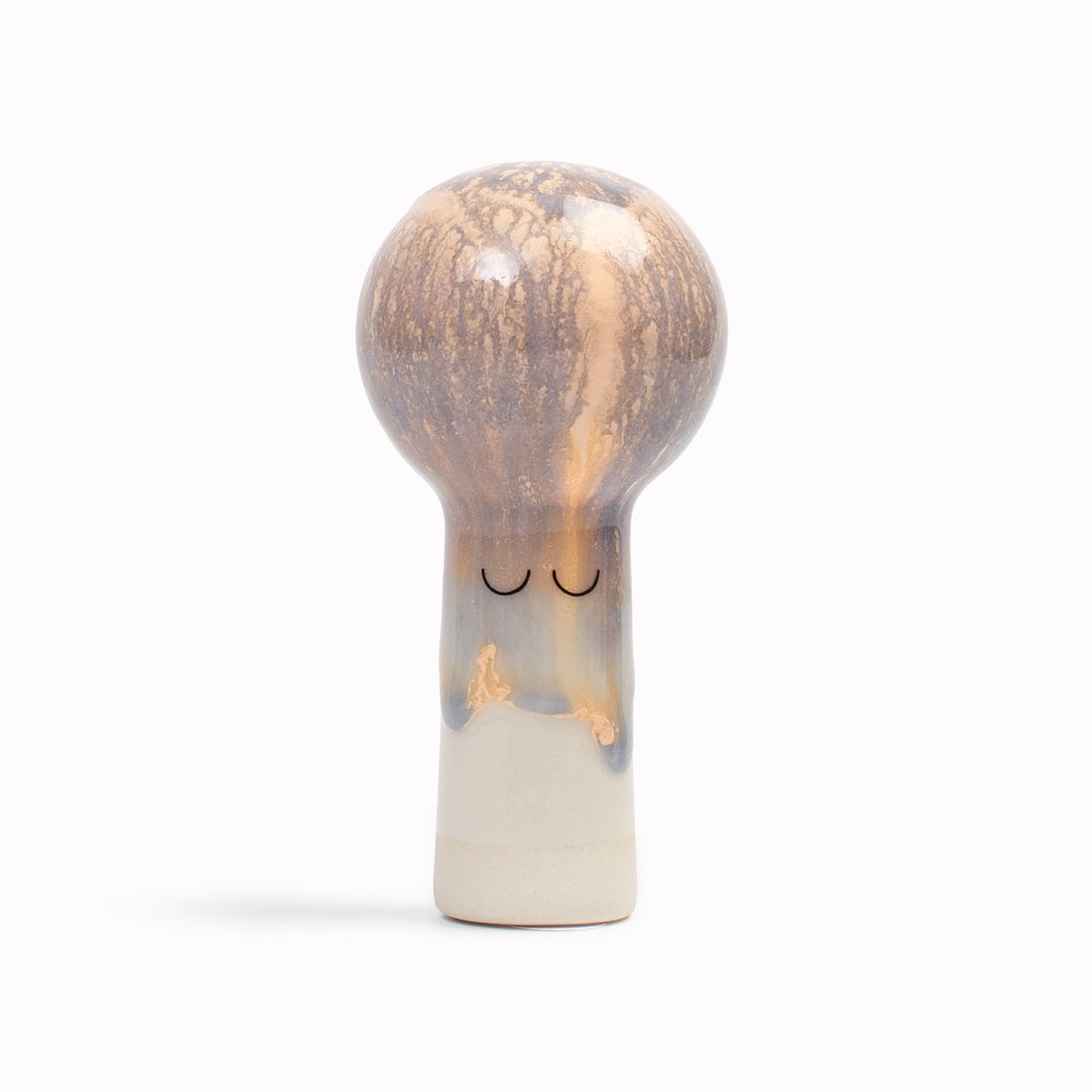 Meet Oni! Oni is a balloon headed, hand glazed ceramic figurine created as a close relative of the classic Arhoj Ghost.