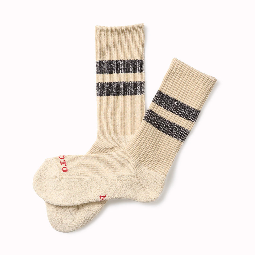 Introducing the Rototo Pile Stripe Marl Socks in Blue and Orange, a perfect blend of style and comfort.