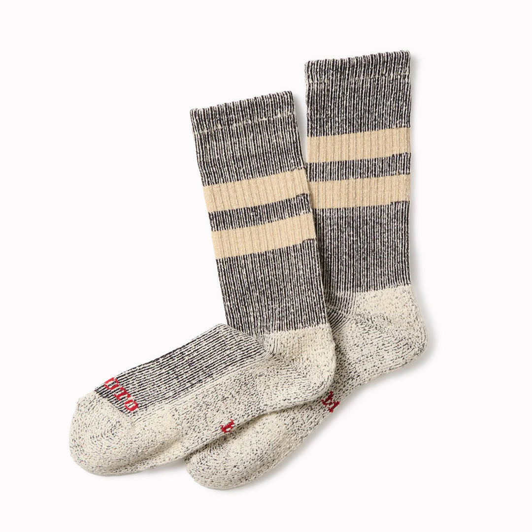 Introducing the Rototo Pile Stripe Marl Socks in Blue and Orange, a perfect blend of style and comfort.