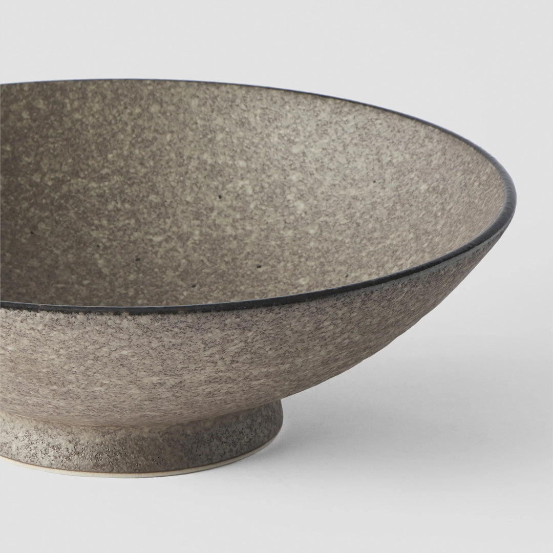 The Earth range features a unique glaze with rustic tones with a focus on simple texture. When turned toward to the light, it shimmers silver - Perfect for noodles, the bowl is around 8cm high and 24cm in diameter.