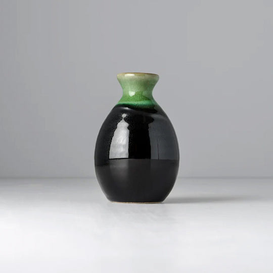 Japanese Sake jug featuring a distinctive black glaze with a bright green drip glaze, measures 13.5cm tall.