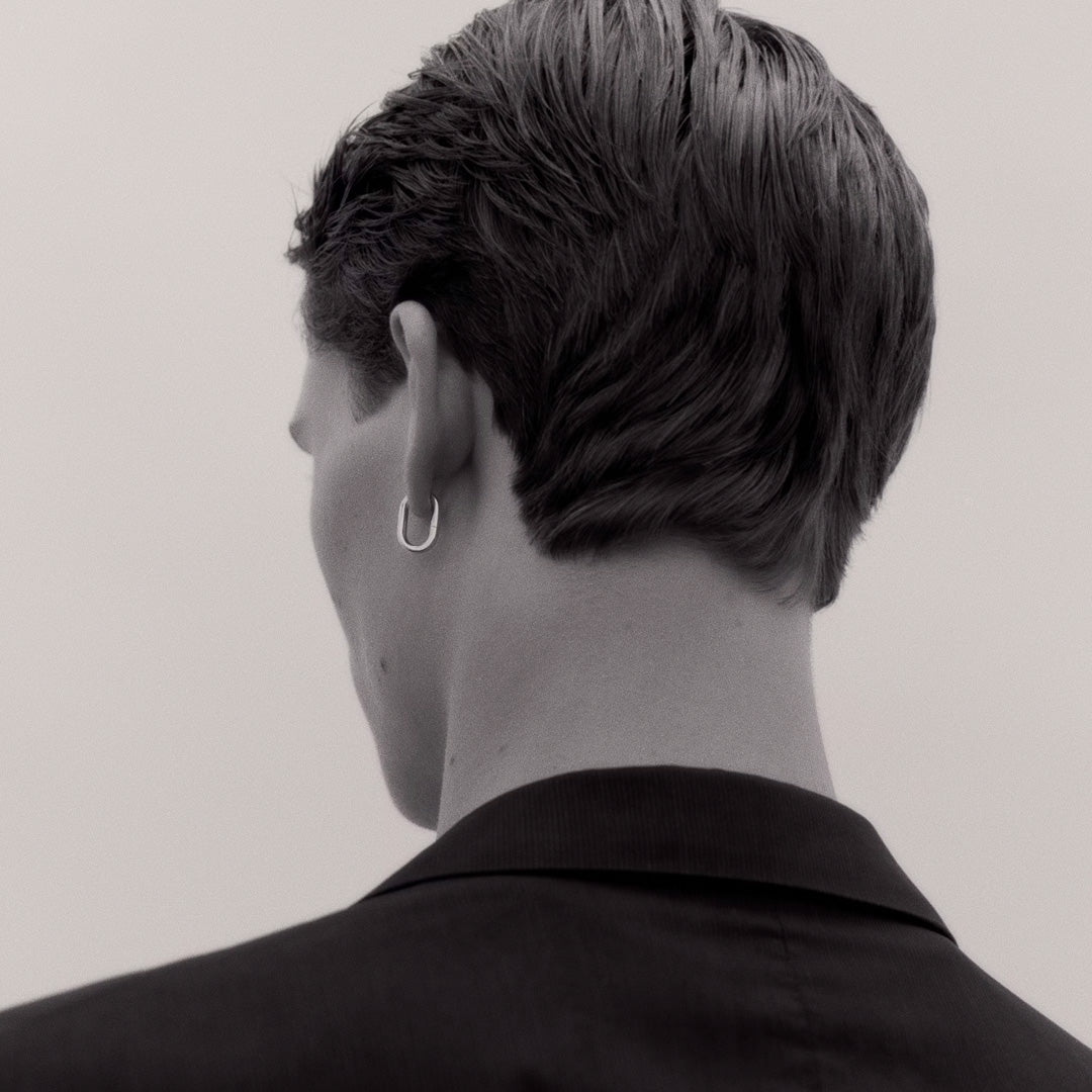 geometrically shaped Slick Huggie earring. It is perfect on its own but also stacks well with other earrings and charms creating a more personalised lookgeometrically shaped Slick Huggie earring. It is perfect on its own but also stacks well with other earrings and charms creating a more personalised look
