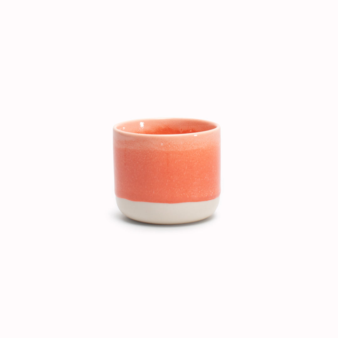 Vermillion Sip Cup - Each piece is handmade in Denmark - meaning glaze colour and finish will never be exactly the same on any two items, but this is absolutely a part of their unique appeal. 