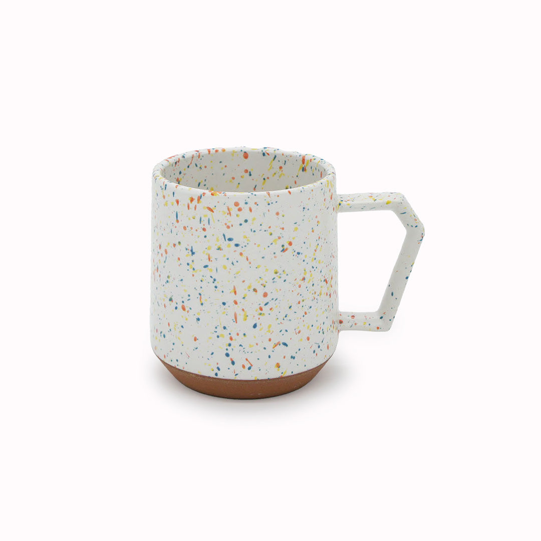 Compact and Easy to hold and stackable for easy storage. This Splash mug has a mixture of orange, yellow, and blue onto a white base with an unglazed base. They are sturdy and comfortable to hold with a unique silhouette.